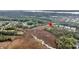 Breathtaking aerial view capturing the community surrounded by lush greenery and serene water features at 160 Palm Cove Way, Mount Pleasant, SC 29466