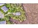 An aerial view of a secluded home surrounded by a marsh and trees at 160 Palm Cove Way, Mount Pleasant, SC 29466