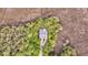 An aerial view of a secluded home surrounded by a marsh and trees at 160 Palm Cove Way, Mount Pleasant, SC 29466