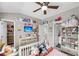 Charming bedroom featuring plush toys, stylish decor, and a built-in shelving for ample storage at 160 Palm Cove Way, Mount Pleasant, SC 29466
