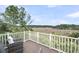 Relaxing deck area with stylish furniture, showcasing serene views of a beautiful marsh landscape at 160 Palm Cove Way, Mount Pleasant, SC 29466
