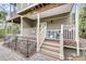 Multi-level patio with railings and cozy seating, perfect for relaxing outdoors with a view at 160 Palm Cove Way, Mount Pleasant, SC 29466