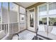 Inviting screened porch with comfortable seating, providing a relaxing spot to enjoy the outdoors at 160 Palm Cove Way, Mount Pleasant, SC 29466