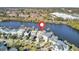 Aerial view of waterfront homes with proximity to amenities and a serene pond at 1615 Paradise Lake Dr, Mount Pleasant, SC 29464