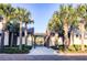 Pool entrance framed by palm trees and pergola at 1615 Paradise Lake Dr, Mount Pleasant, SC 29464
