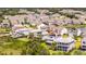 Panoramic aerial view of a neighborhood with tree-lined streets, a pond, and well-maintained homes at 1714 Fort Palmetto Cir, Mount Pleasant, SC 29466
