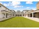 A gorgeous courtyard showcases a lush green lawn, perfect for outdoor activities and relaxation at 1714 Fort Palmetto Cir, Mount Pleasant, SC 29466