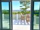 Enjoy breathtaking views from the balcony, complete with outdoor seating for relaxation at 1714 Fort Palmetto Cir, Mount Pleasant, SC 29466