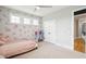 Bright bedroom with a ceiling fan, complemented by a view of the room's layout at 1714 Fort Palmetto Cir, Mount Pleasant, SC 29466