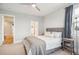 This bedroom has neutral walls, carpet and decor, as well as an ensuite bathroom just off the main room at 1714 Fort Palmetto Cir, Mount Pleasant, SC 29466