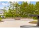 The community features an inviting fire pit surrounded by lush landscaping, perfect for cozy gatherings and outdoor enjoyment at 1714 Fort Palmetto Cir, Mount Pleasant, SC 29466