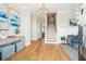 Spacious foyer with hardwood floors, lovely decor, stairway and light gray paint at 1714 Fort Palmetto Cir, Mount Pleasant, SC 29466