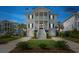 Inviting two-story home with dual-level porches, well-manicured landscaping, and a spacious driveway at 1714 Fort Palmetto Cir, Mount Pleasant, SC 29466
