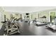 A modern fitness center is fully equipped with treadmills, weights, and exercise machines for a complete workout experience at 1714 Fort Palmetto Cir, Mount Pleasant, SC 29466