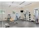 Bright gym featuring state-of-the-art equipment and a wall-mounted television at 1714 Fort Palmetto Cir, Mount Pleasant, SC 29466