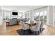 A modern living room with a dining area, and view of the outside patio at 1714 Fort Palmetto Cir, Mount Pleasant, SC 29466