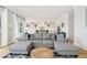 Beautiful living room with a grey sofa, and modern view to the kitchen at 1714 Fort Palmetto Cir, Mount Pleasant, SC 29466