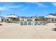 A resort-style pool offers relaxing lounge chairs and umbrellas, perfect for leisure and enjoying the sunshine at 1714 Fort Palmetto Cir, Mount Pleasant, SC 29466