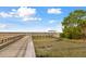 A tranquil boardwalk extends over a scenic marsh, offering stunning natural views and a peaceful retreat at 1714 Fort Palmetto Cir, Mount Pleasant, SC 29466