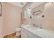 Charming half bath featuring modern fixtures and a marble vanity with storage at 1743 Orange Grove Shores Dr, Charleston, SC 29407