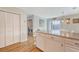 Open concept kitchen with stainless appliances and plenty of counter space plus laundry area at 1743 Orange Grove Shores Dr, Charleston, SC 29407