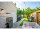 Backyard featuring a patio, grill, and artificial turf at 1751 Brittlebush Ln, Johns Island, SC 29455