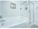Bright bathroom features a separate tub and shower with glass door at 1751 Brittlebush Ln, Johns Island, SC 29455