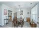 Well-lit dining area with wooden table, decorative pendant light, and stylish decor at 1751 Brittlebush Ln, Johns Island, SC 29455