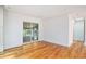 Bright living room with hardwood floors and glass sliding door at 1833 St Julian Dr, Charleston, SC 29407