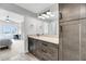 Stylish bathroom with granite countertops, drawers and wood floors at 1948 Marsh Oak Ln, Seabrook Island, SC 29455