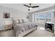 Bedroom offers natural light and views, featuring a bed and a desk for a versatile living space at 1948 Marsh Oak Ln, Seabrook Island, SC 29455