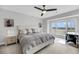 Bedroom offers natural light and views, featuring a bed and a desk for a versatile living space at 1948 Marsh Oak Ln, Seabrook Island, SC 29455