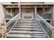 Stairway leading to the front entrance of the condo with covered porches and exterior decor at 1948 Marsh Oak Ln, Seabrook Island, SC 29455