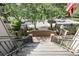 Brick pathway leading to the front door surrounded by lush landscaping and mature trees at 1948 Marsh Oak Ln, Seabrook Island, SC 29455