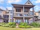 Stunning two-story condo building with balconies overlooking the marina at 1948 Marsh Oak Ln, Seabrook Island, SC 29455
