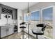 Wet bar area has a wine rack and refrigerator, with a waterfront view at 1948 Marsh Oak Ln, Seabrook Island, SC 29455