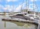 Daytime view of boats docked alongside the marina dock, with blue skies overhead at 1948 Marsh Oak Ln, Seabrook Island, SC 29455