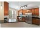 Well-equipped kitchen features stainless steel appliances, granite counters, and tile flooring at 2000 Belle Isle Ave # 204, Mount Pleasant, SC 29464