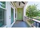 This patio features a fan and green siding at 2000 Belle Isle Ave # 204, Mount Pleasant, SC 29464