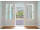This indoor shot features plantation shutters on a window and door at 2000 Belle Isle Ave # 204, Mount Pleasant, SC 29464