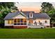 Beautiful backyard with a spacious screened in porch, deck, and well maintained lawn at 2040 Shell Ring Cir, Mount Pleasant, SC 29466