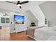 Cozy bedroom featuring hardwood floors, a TV, and a window seat at 2040 Shell Ring Cir, Mount Pleasant, SC 29466