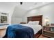 Bedroom features a wooden bed frame, ceiling fan, window seat, and hardwood floors at 2040 Shell Ring Cir, Mount Pleasant, SC 29466