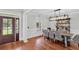 Inviting dining room featuring a wood table, stylish chairs, and a modern light fixture at 2040 Shell Ring Cir, Mount Pleasant, SC 29466