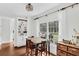 Charming dining room featuring a large window with a view of the landscaped backyard at 2040 Shell Ring Cir, Mount Pleasant, SC 29466