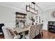 Charming dining room featuring wood table, upholstered chairs, and elegant decor at 2040 Shell Ring Cir, Mount Pleasant, SC 29466