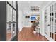Inviting foyer featuring wood floors, staircase, and views into the main living areas at 2040 Shell Ring Cir, Mount Pleasant, SC 29466