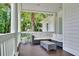 Relaxing outdoor space with wicker seating, glass coffee table, and lovely views at 2040 Shell Ring Cir, Mount Pleasant, SC 29466