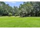 Expansive front yard with manicured lawn at 2040 Shell Ring Cir, Mount Pleasant, SC 29466