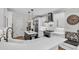 Modern kitchen with white cabinets, stainless steel appliances, and granite countertops at 2040 Shell Ring Cir, Mount Pleasant, SC 29466